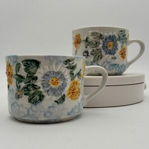Daisy Patch Tabletops Unlimited 2 Floral Embossed Ceramic Mugs Blue Yellow White